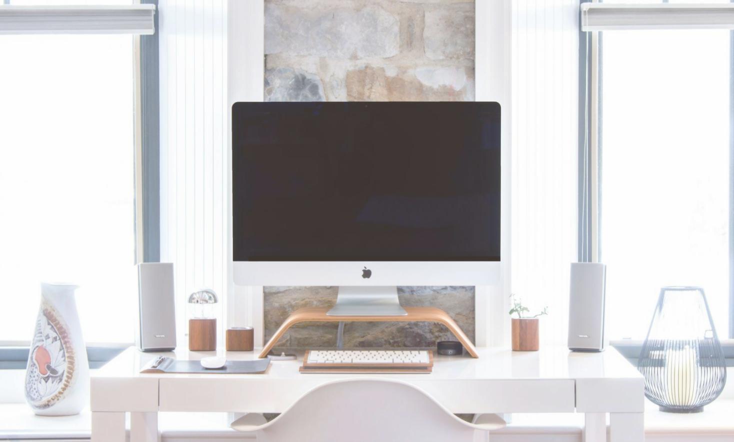 tavionkarex team reviewing budget analytics on multiple screens